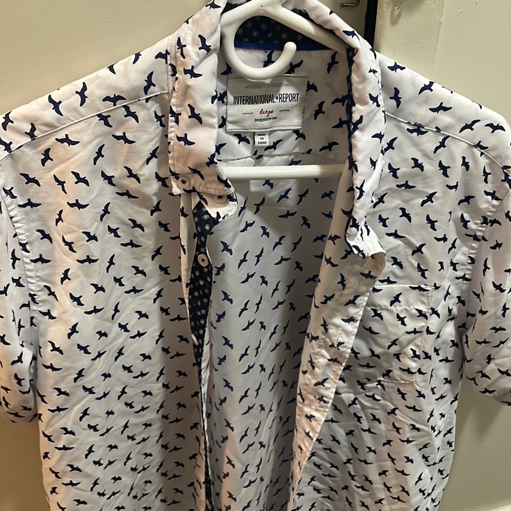 Large - international report - white shirt with blue birds!
